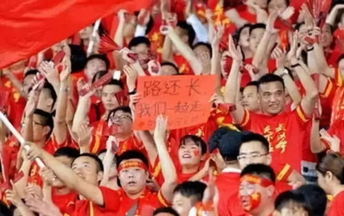 国足生死战背后的十二人军团